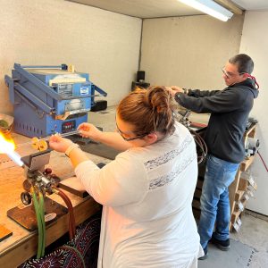 Couple Blowing Glass in Denver
