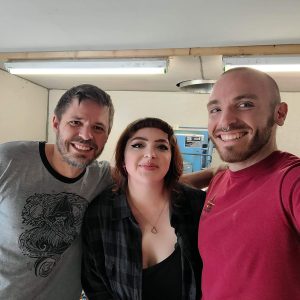 Couple with Glass Blowing Instructor